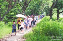 红土地上新绿意 水乡风情展新姿